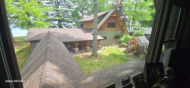 exterior space featuring a patio area and a yard