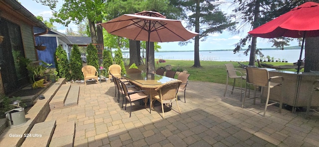 view of patio / terrace featuring a water view