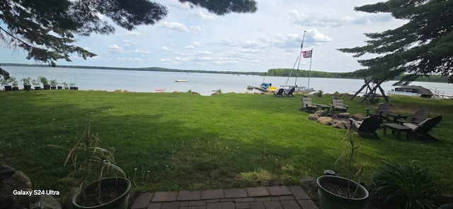 view of yard with a water view