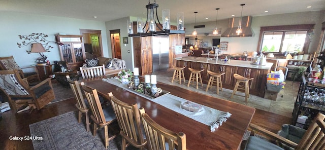 dining space featuring dark wood-type flooring