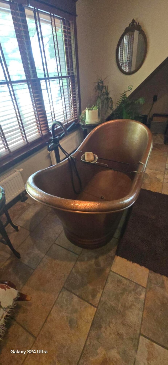 bathroom featuring a bathing tub