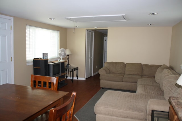 living room with dark wood-type flooring