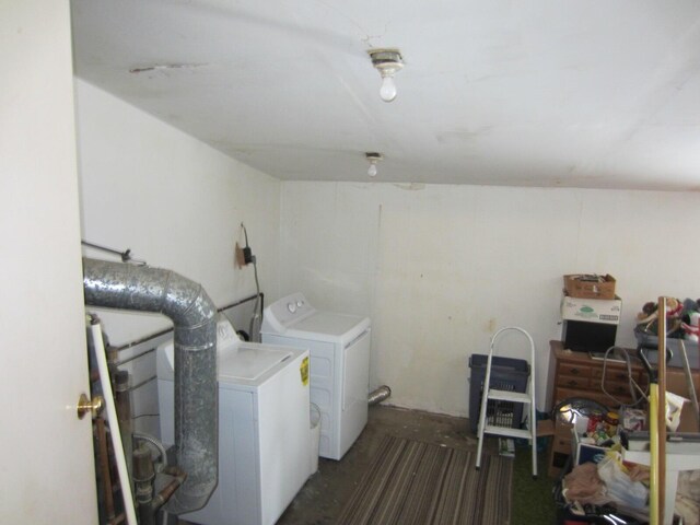 laundry room with washing machine and clothes dryer