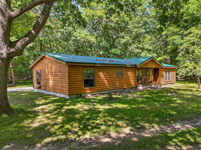 exterior space featuring a front lawn