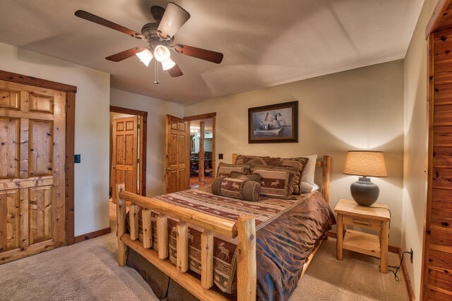 bedroom featuring carpet and ceiling fan