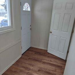 entrance foyer featuring hardwood / wood-style flooring