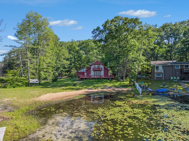 view of yard featuring a wooden deck