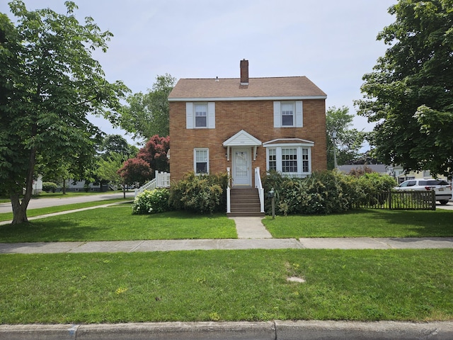 view of front of house with a front yard