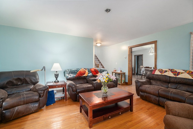 living room with light hardwood / wood-style flooring