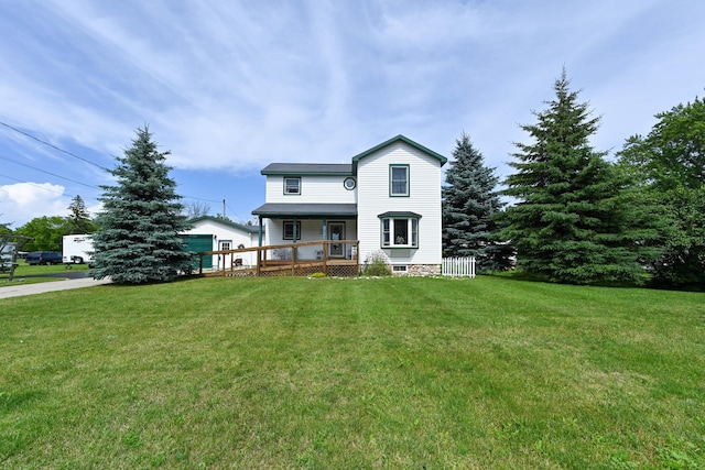 view of front of house with a front lawn and a porch