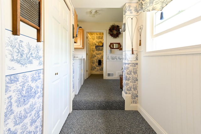 corridor with carpet flooring