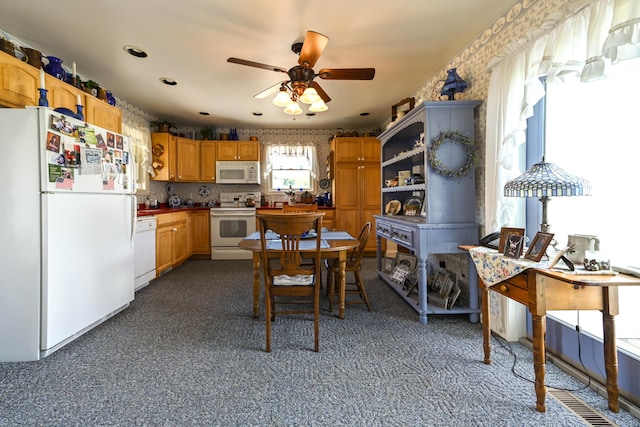 kitchen with ceiling fan, decorative backsplash, and white appliances