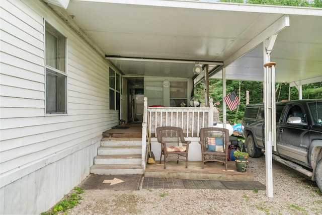 view of patio / terrace featuring a carport