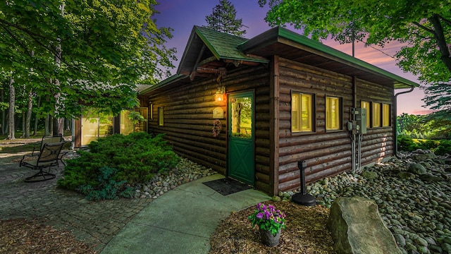 view of property exterior at dusk