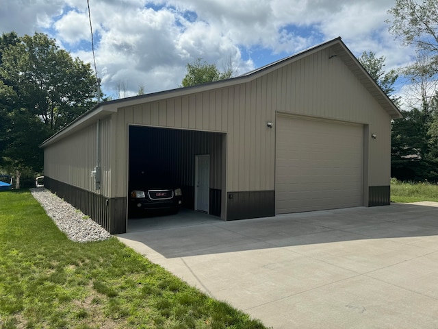 garage with a lawn