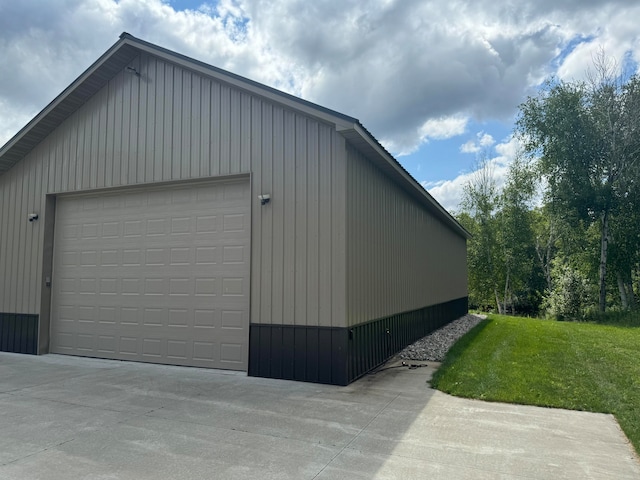 garage featuring a yard