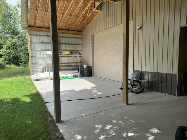 view of patio featuring a garage