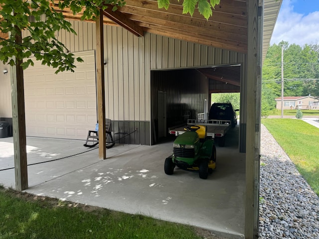 view of patio with a garage and a carport