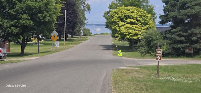 view of road featuring traffic signs