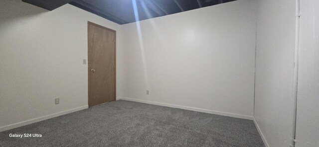 spare room featuring carpet flooring