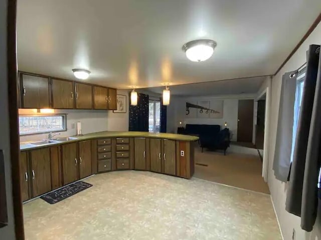 kitchen featuring sink and kitchen peninsula