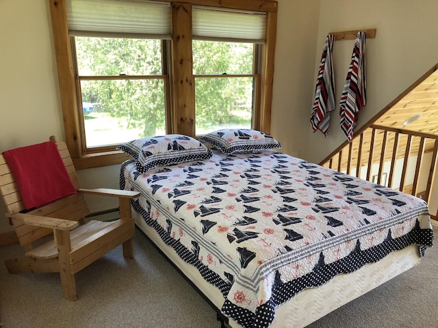 bedroom featuring carpet