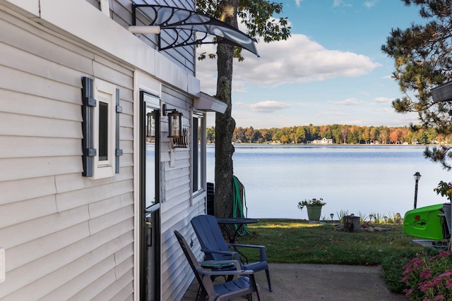 exterior space with a water view