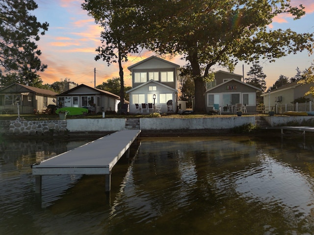 dock area featuring a water view