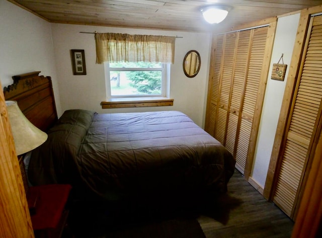 bedroom featuring wood ceiling and hardwood / wood-style floors