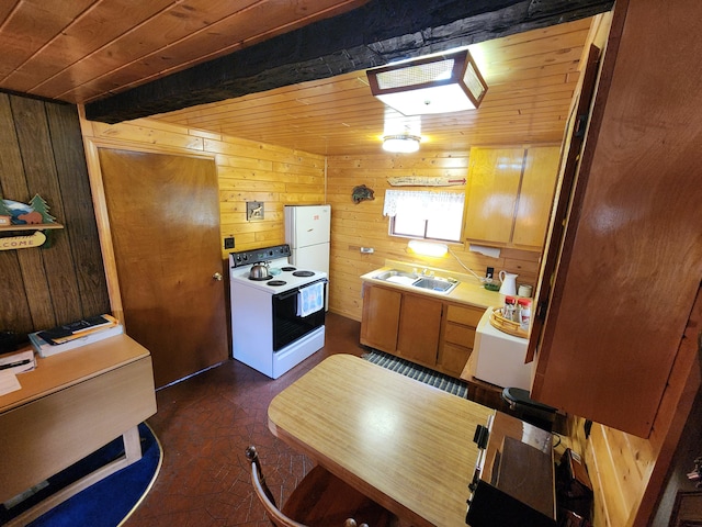 kitchen featuring wood walls and white range with electric cooktop