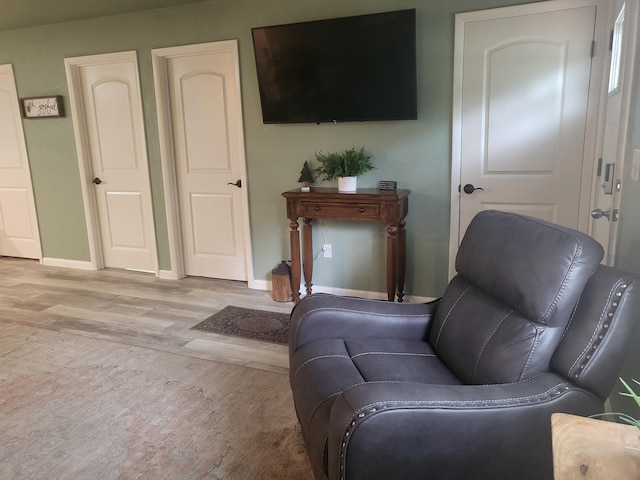 sitting room with light hardwood / wood-style floors