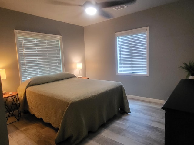 bedroom featuring ceiling fan and light wood-type flooring