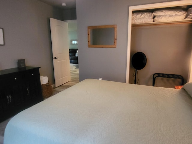 bedroom featuring hardwood / wood-style flooring