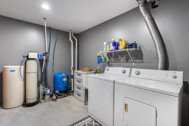 washroom featuring laundry area and washer and clothes dryer