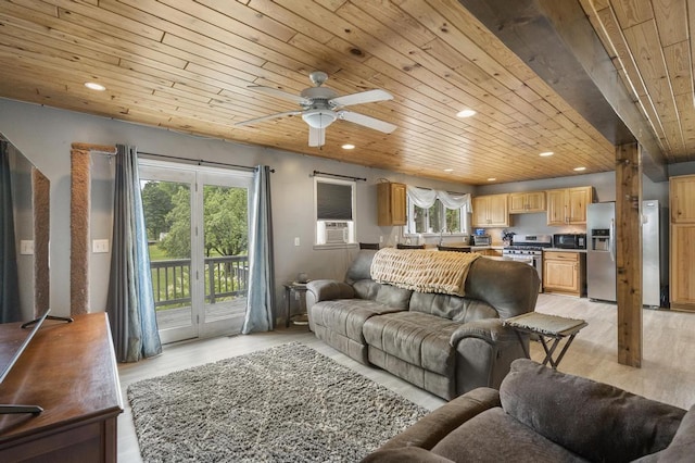 living area with light wood-style floors, recessed lighting, wood ceiling, and a healthy amount of sunlight