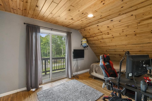 interior space with wood ceiling, baseboards, vaulted ceiling, and wood finished floors