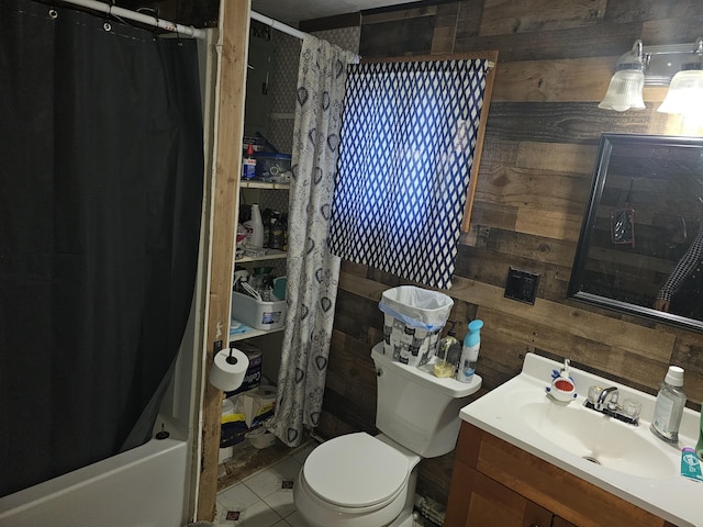 full bathroom featuring vanity, shower / bath combo, tile patterned floors, wooden walls, and toilet