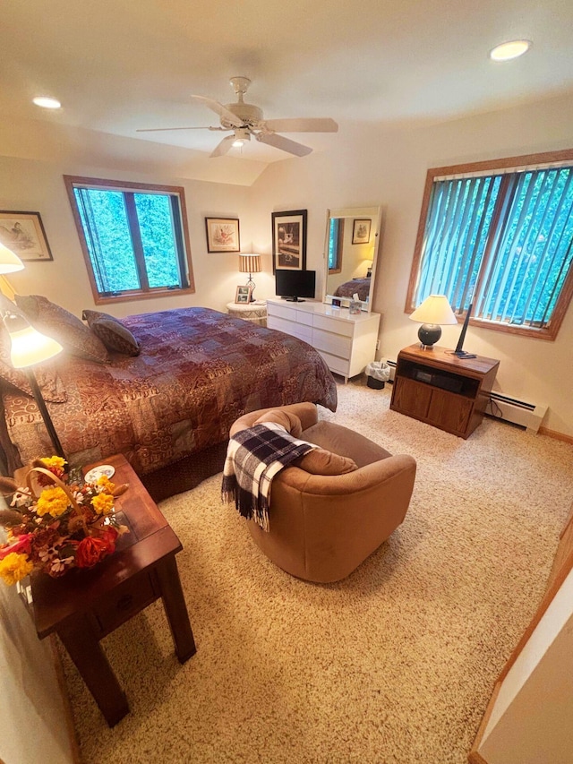 bedroom featuring ceiling fan, recessed lighting, a baseboard radiator, and carpet