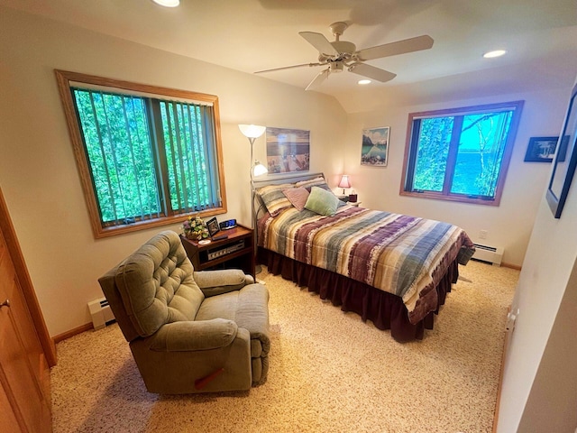 carpeted bedroom with baseboards, baseboard heating, a baseboard radiator, and recessed lighting