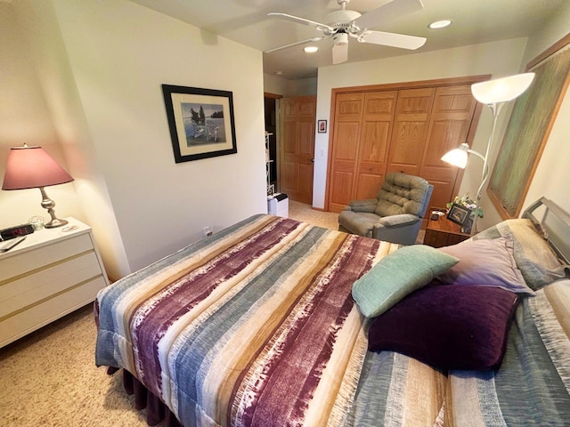 bedroom featuring carpet, a closet, a ceiling fan, and recessed lighting