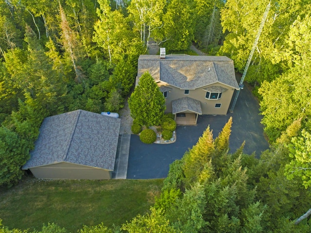 aerial view featuring a forest view