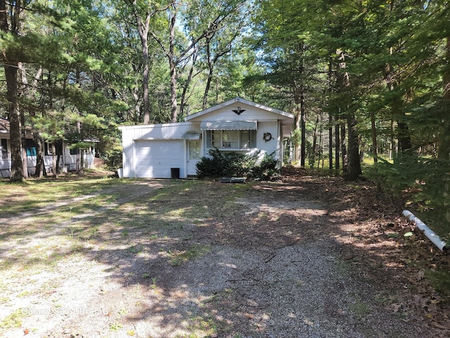 exterior space with a garage