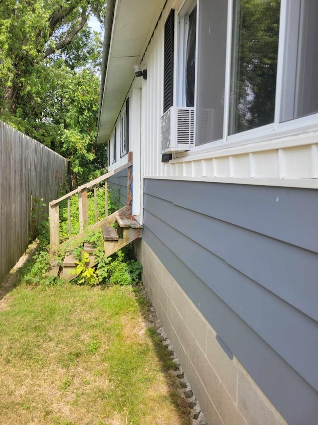 view of home's exterior with a lawn