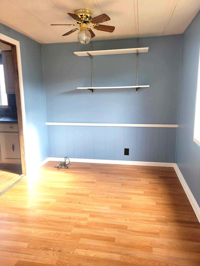 spare room with ceiling fan and light hardwood / wood-style flooring