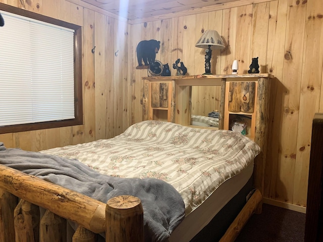 bedroom with wood walls and ornamental molding