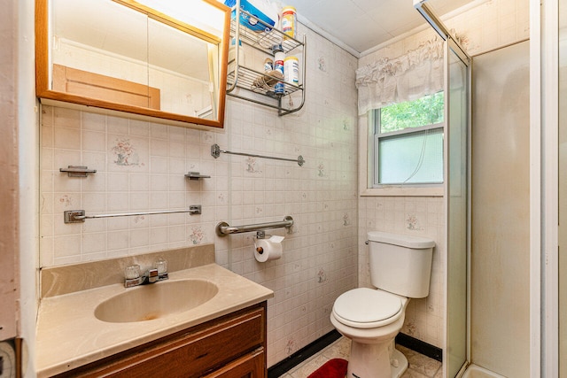 bathroom with walk in shower, toilet, tile patterned floors, tile walls, and vanity