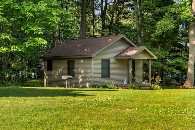 view of front of home with a front yard