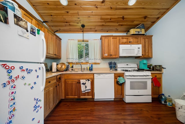 kitchen with white appliances, dark hardwood / wood-style flooring, lofted ceiling, hanging light fixtures, and sink