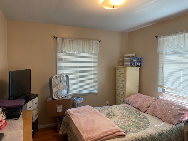 bedroom featuring hardwood / wood-style floors