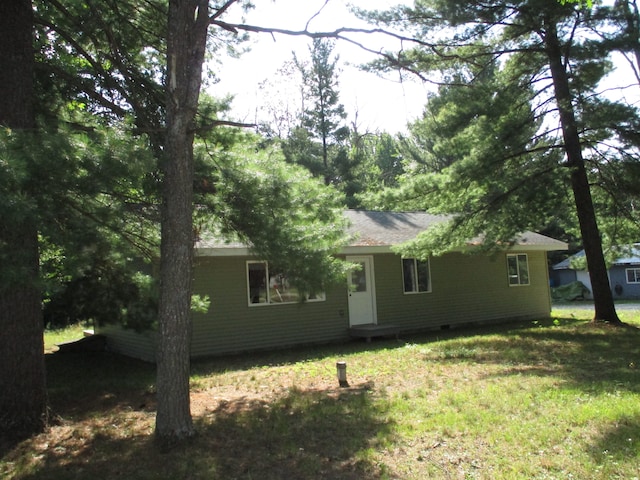 exterior space with a yard